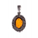 Silver pendant with amber "The Blow of the Wind"