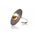 Blackened silver ring with landscaped amber 