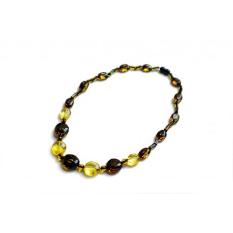 Contrastive transparent yellow lemon and moss colors' amber pieces