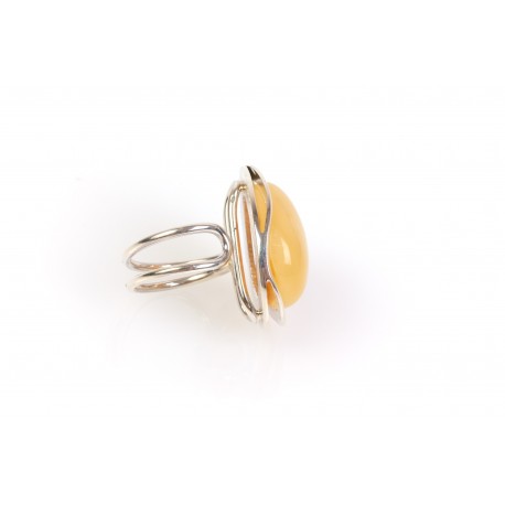 Silver ring with yellowish amber "The Wave of Spatter"