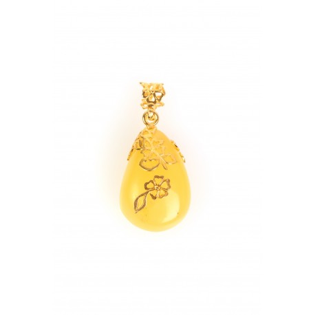 Amber pendant with the gilded silver