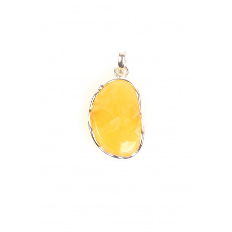 Amber pendant decorated with a silver thread