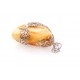 Massive amber pendant decorated with silver flowers