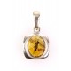 Silver pendant with amber inclusion