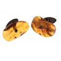 Antiquarian cufflinks of clear, cognac amber