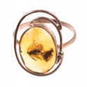 Gold ring with amber inclusion
