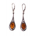 Forged silver earrings with cognac amber
