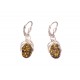 Silver earrings with green amber