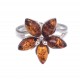 Silver ring with green, lemon-colored and cognac amber
