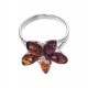 Silver ring with green, lemon-colored and cognac amber
