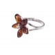 Silver ring with green, lemon-colored and cognac amber