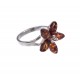 Silver ring with green, lemon-colored and cognac amber