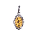 Amber - silver pendant with inclusions.