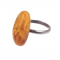 Metal ring with antique Baltic amber