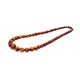 Diamond grinding necklace thread from moss green colour amber pieces