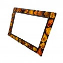 Photo frame decorated with natural amber