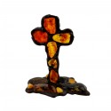 Cross decorated with natural amber