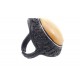 Black leather ring with light yellow-colored amber