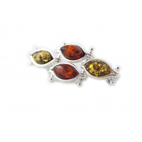 Silver brooch with green and cognac-colored amber