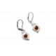 Silver earrings with cognac-colored amber eye