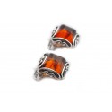 Square clips with clear cognac-colored amber