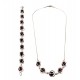 Silver necklace with cherry-color amber