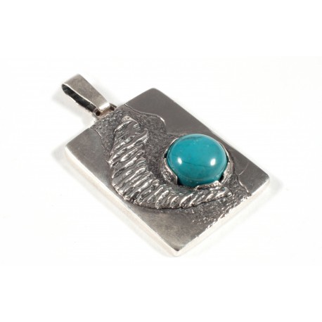 Silver pendant with turquoise inlay