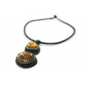 Black leather necklace with yellowish-green amber