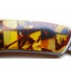 Knife decorated with mottled amber mosaic