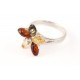 Silver ring with green, lemon-colored and cognac amber