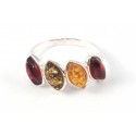 Silver ring with lemon-colored, green and intense cognac amber