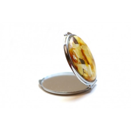 Hand mirror decorated with the Baltic amber