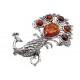 Silver brooch with amber "Peacock"