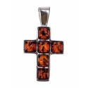 Silver pendant-cross with amber
